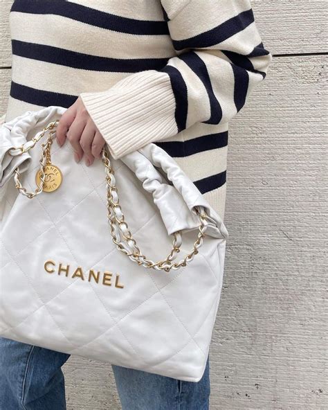 chanel white handbag with pink emblem|where to buy chanel 22.